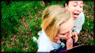 Two Girlfriends Suck Cock in the Woods – Threesome Outdoor Blowjob – Public POV